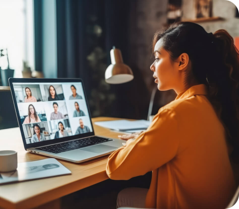 A young woman participating in an online meeting